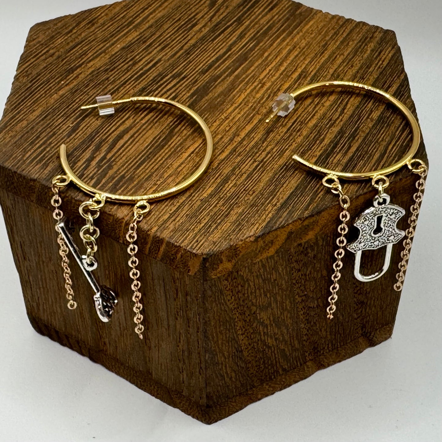 Gold hoop studs with lock and key