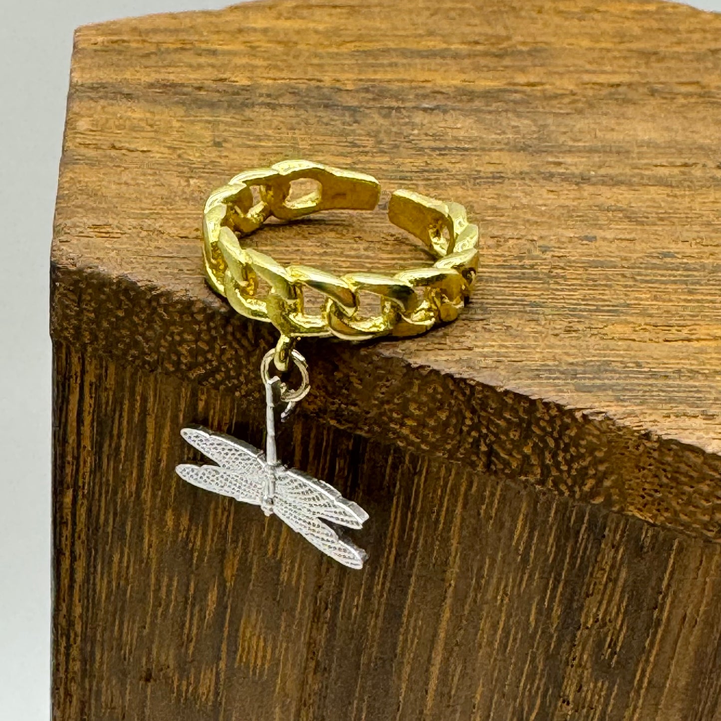 Gold chain ring with silver dragonfly