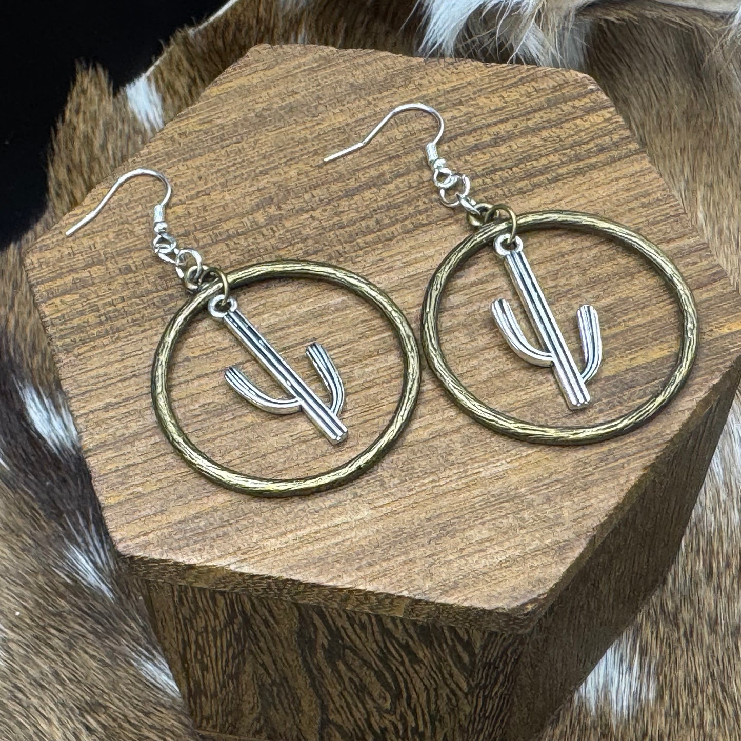 Saguaros in brass hoops