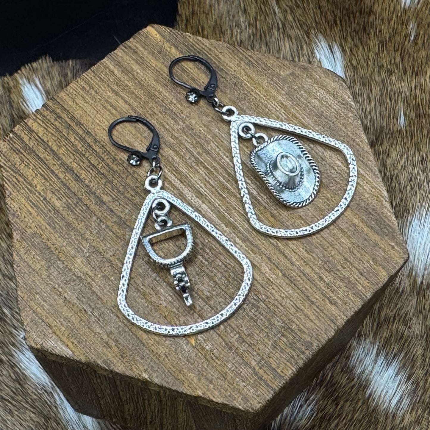 Spur and hat earrings