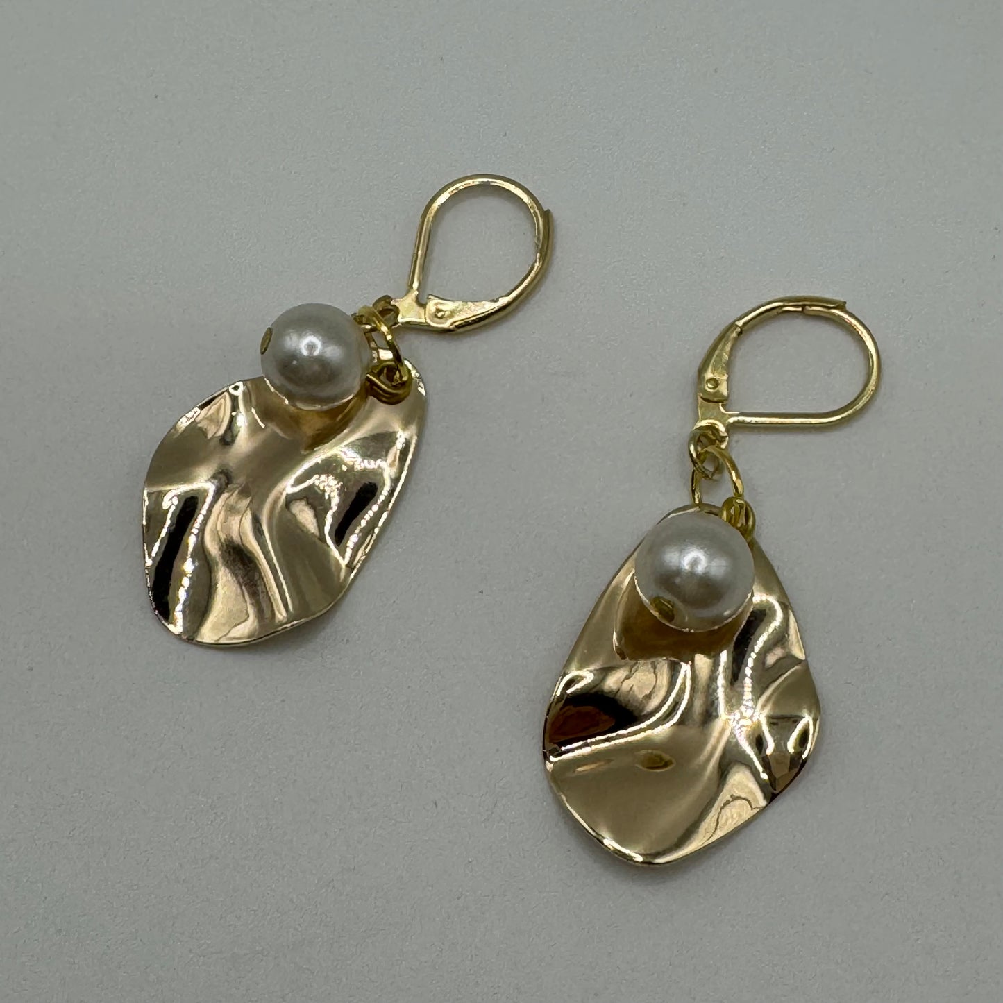Wavy gold with pearl drop earrings