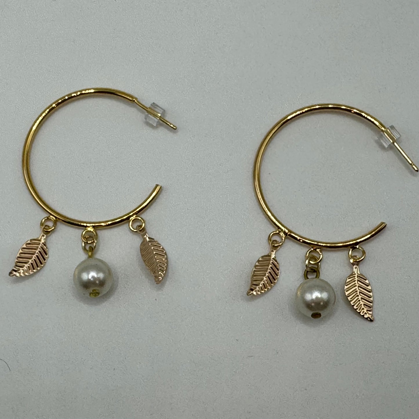 Gold hoops with pearl and leaves
