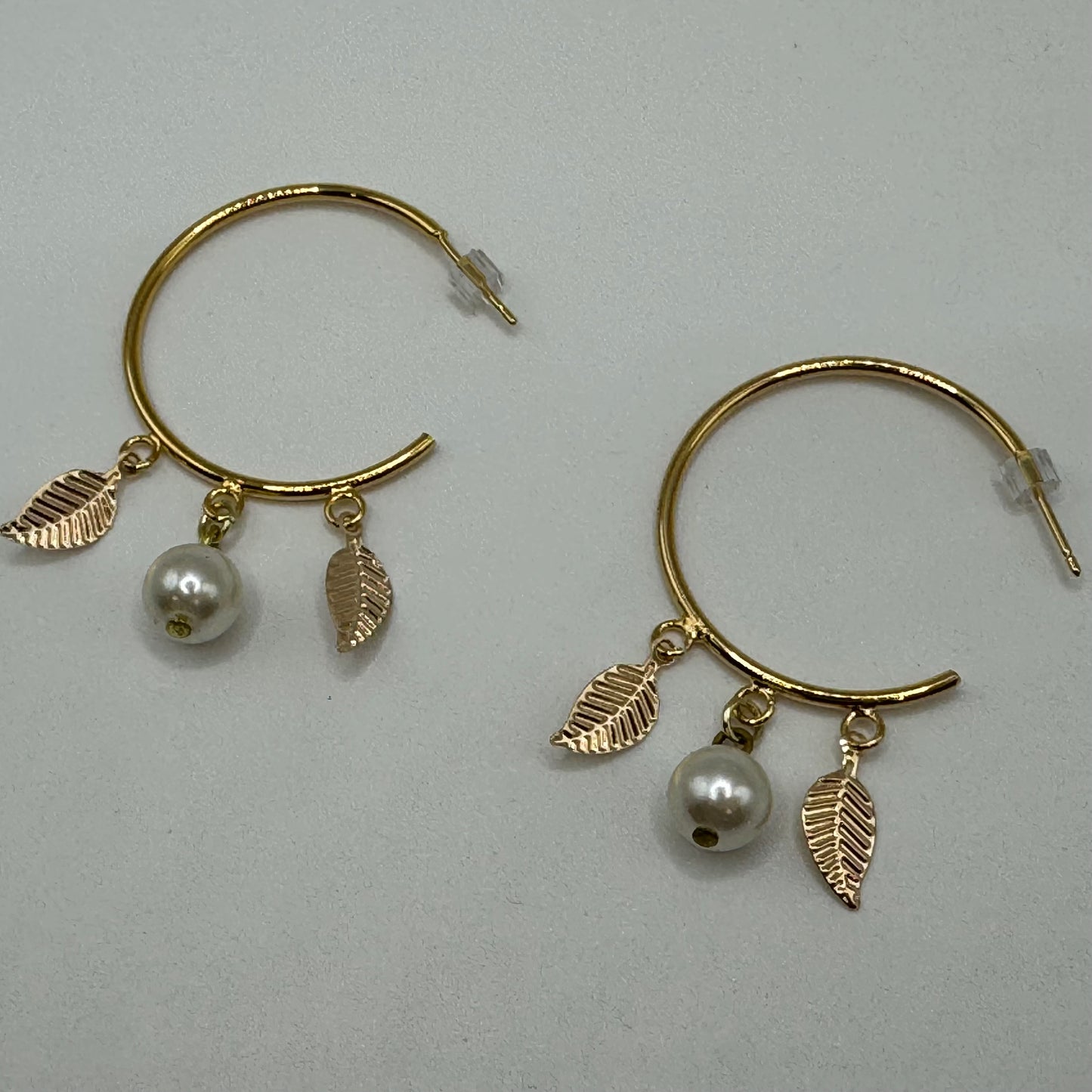 Gold hoops with pearl and leaves