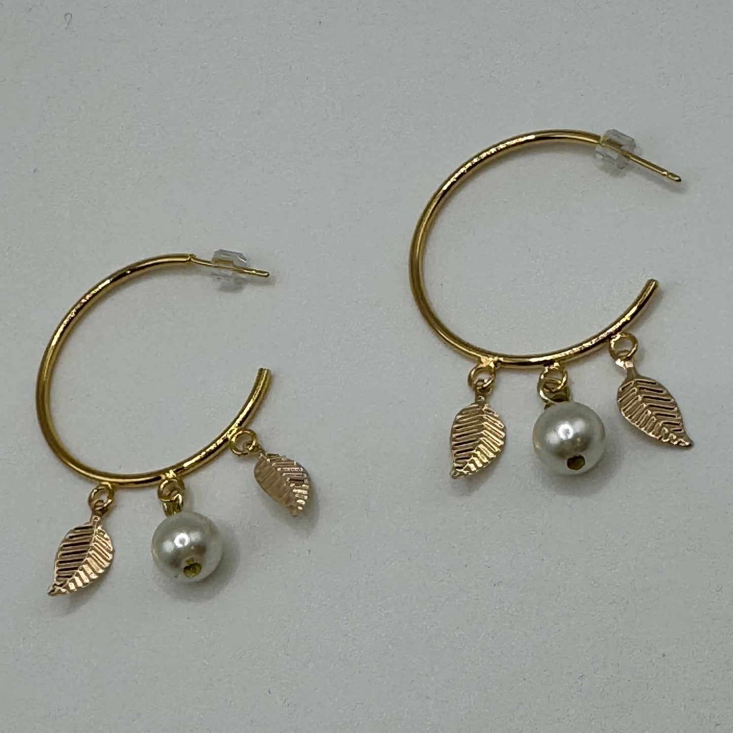 Gold hoops with pearl and leaves