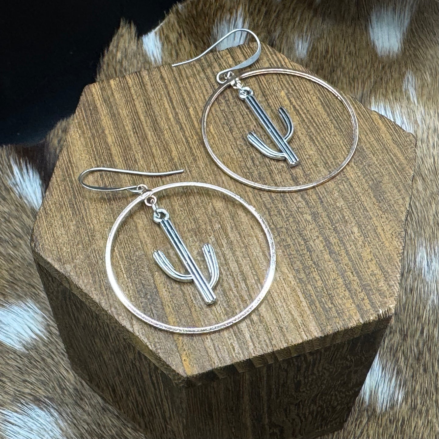 Saguaros in copper hoops