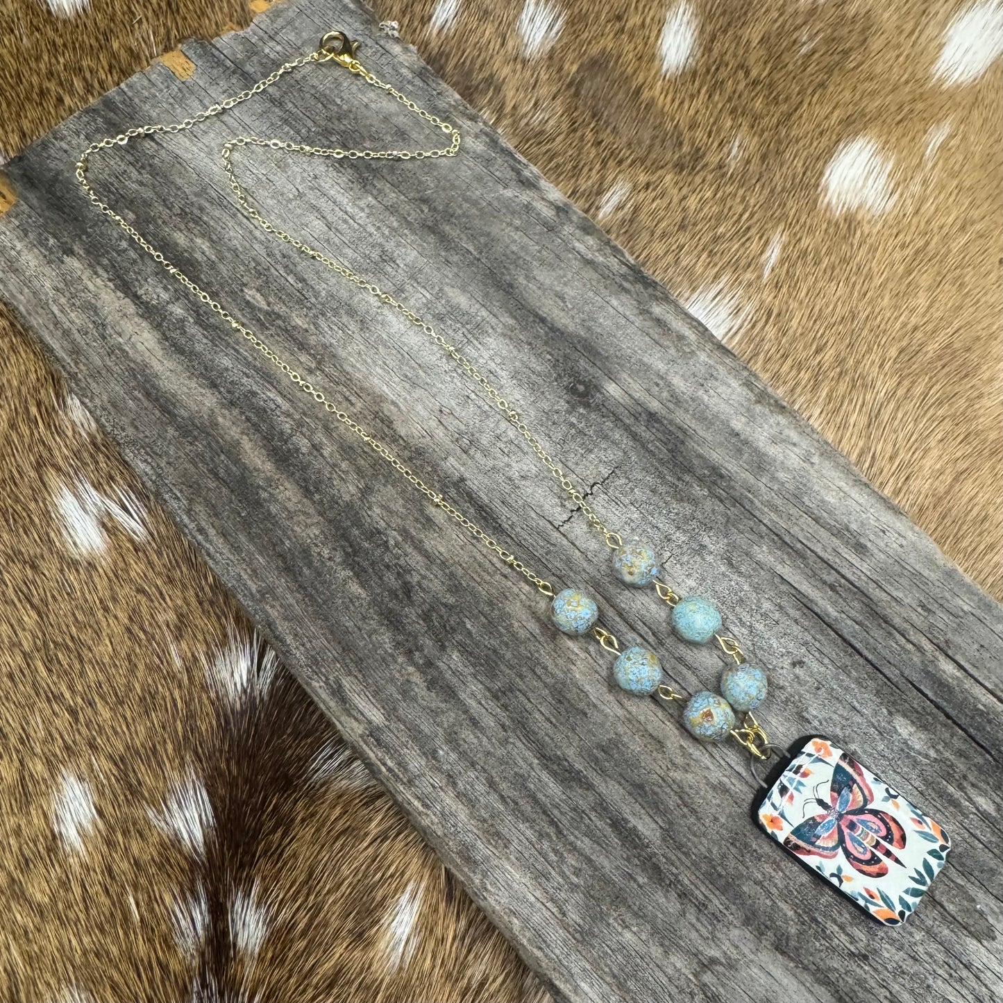 Painted butterfly necklace