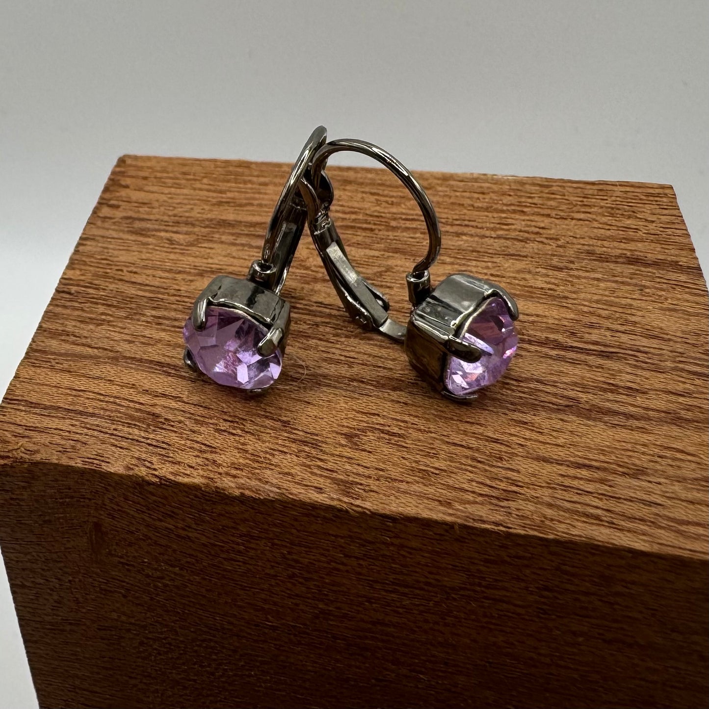 Violet gems in gunmetal lever backs