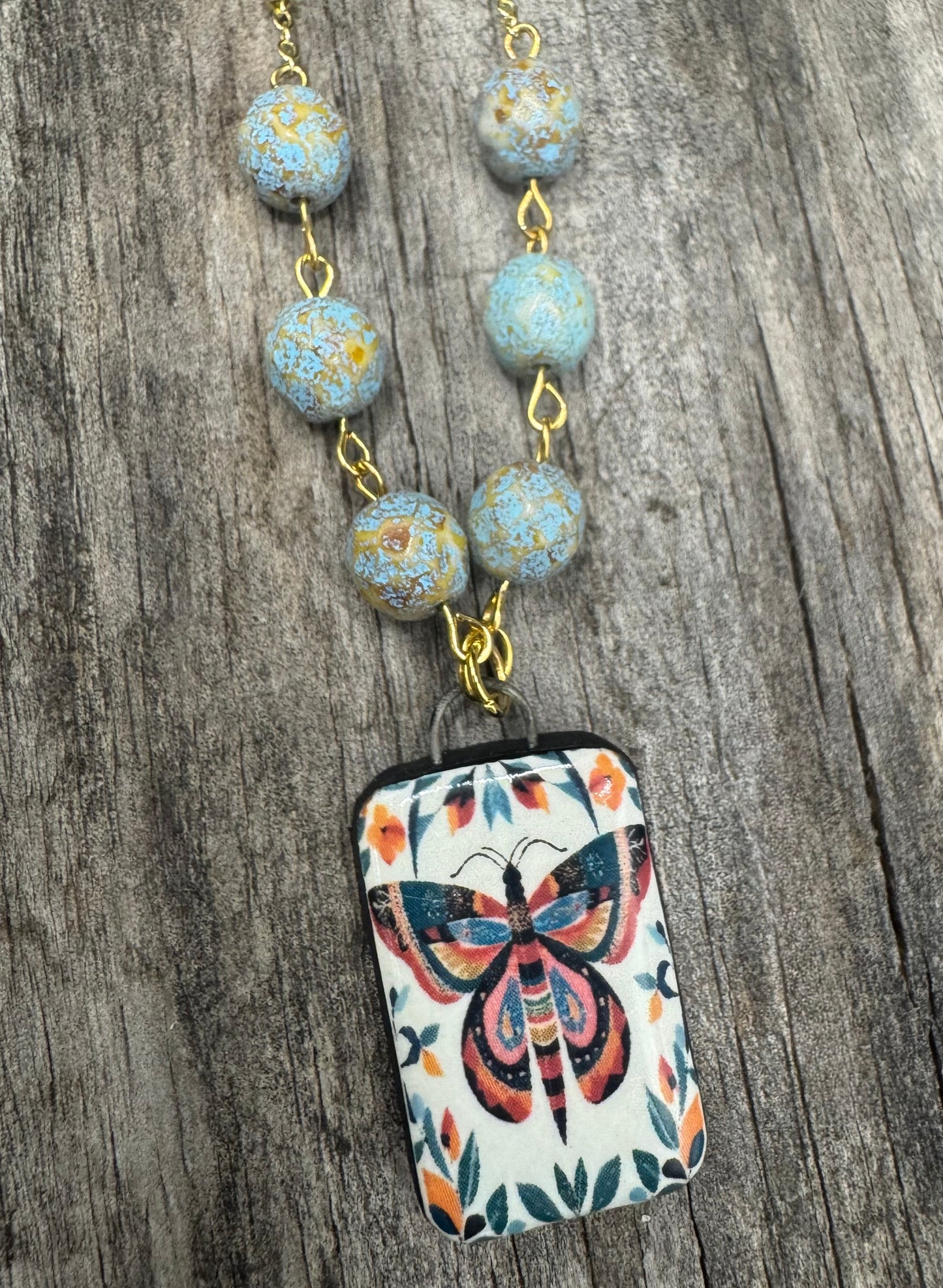 Painted butterfly necklace