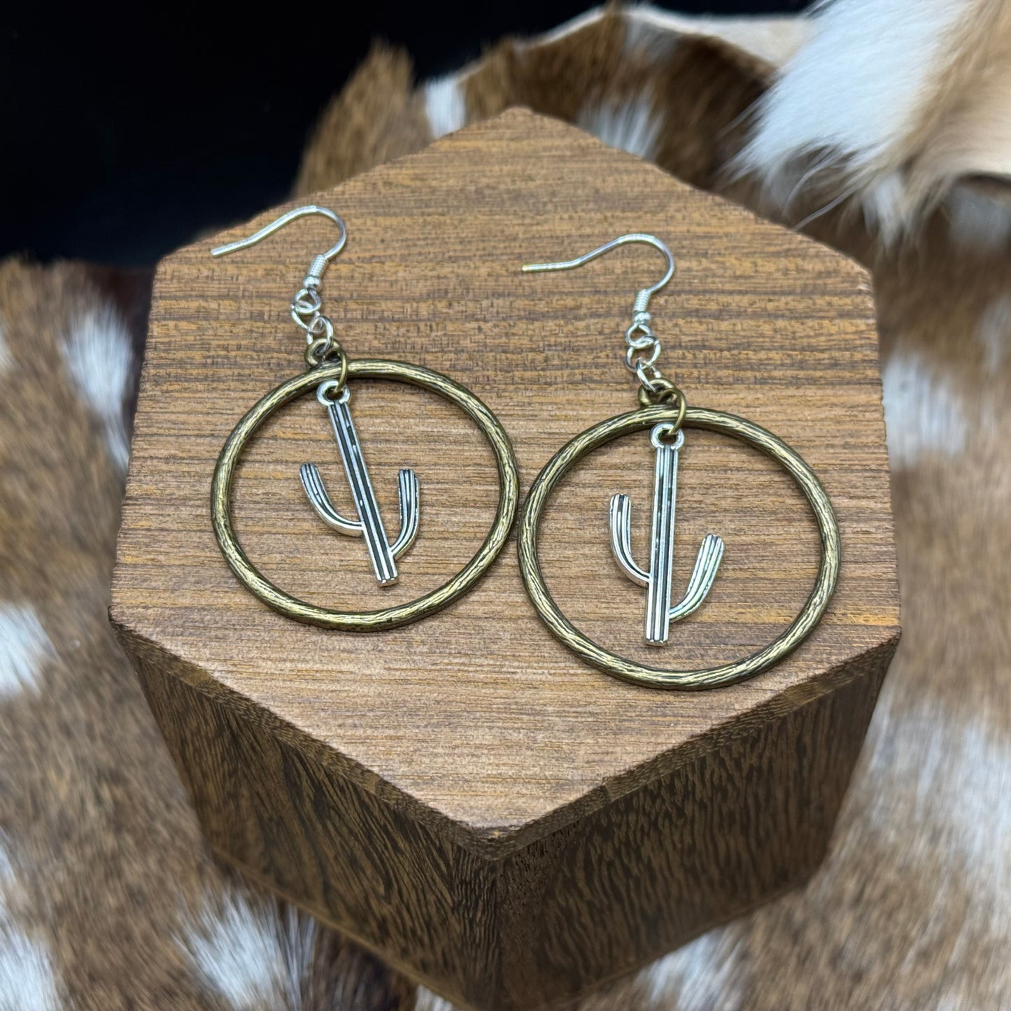 Saguaros in brass hoops