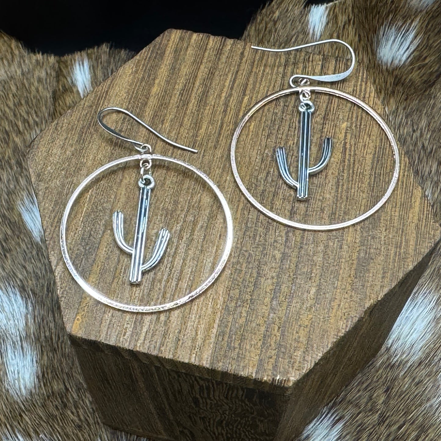 Saguaros in copper hoops