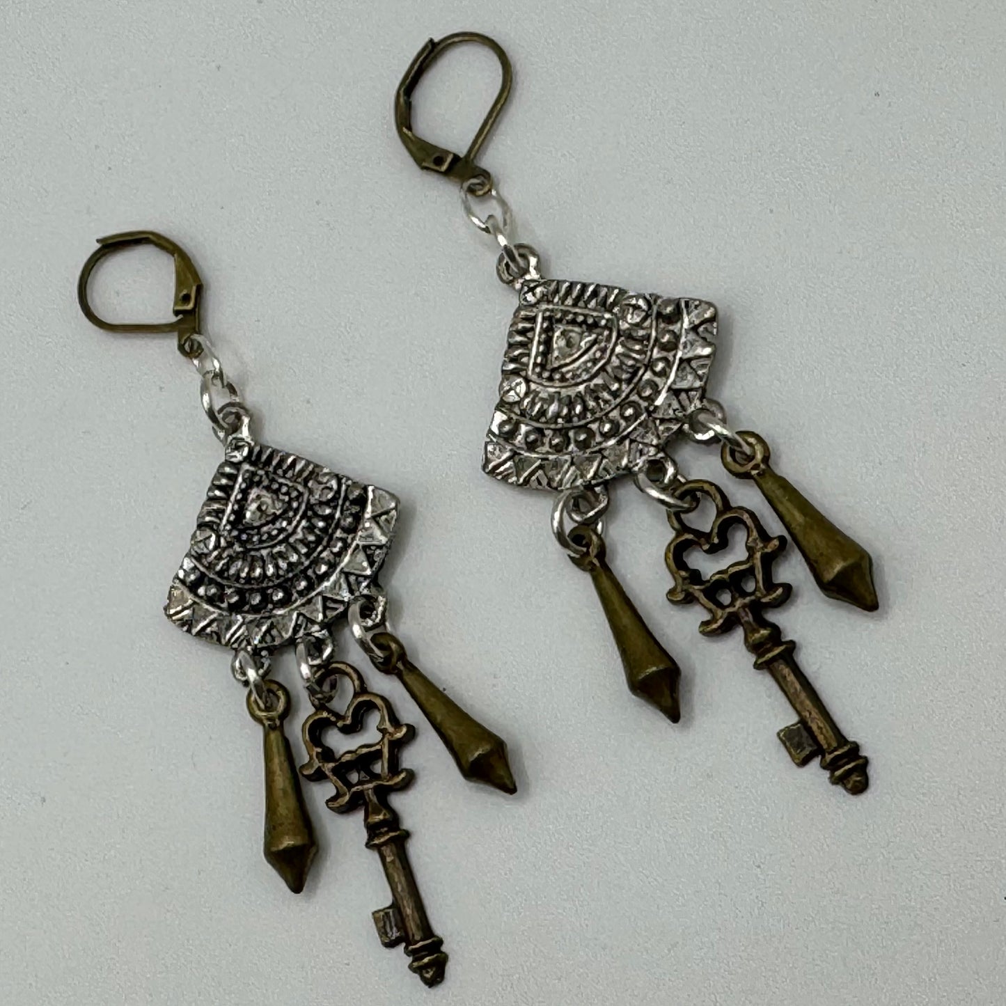 Mixed-metal fans with keys earrings