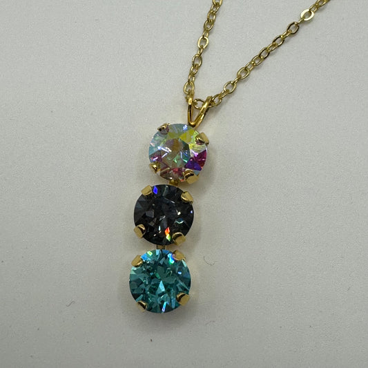 Gold necklace with 3 gemstones